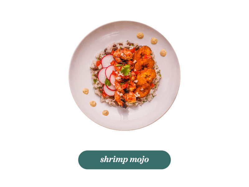 Shrimp mojito dish on a white plate with 'shrimp mojito' text label.